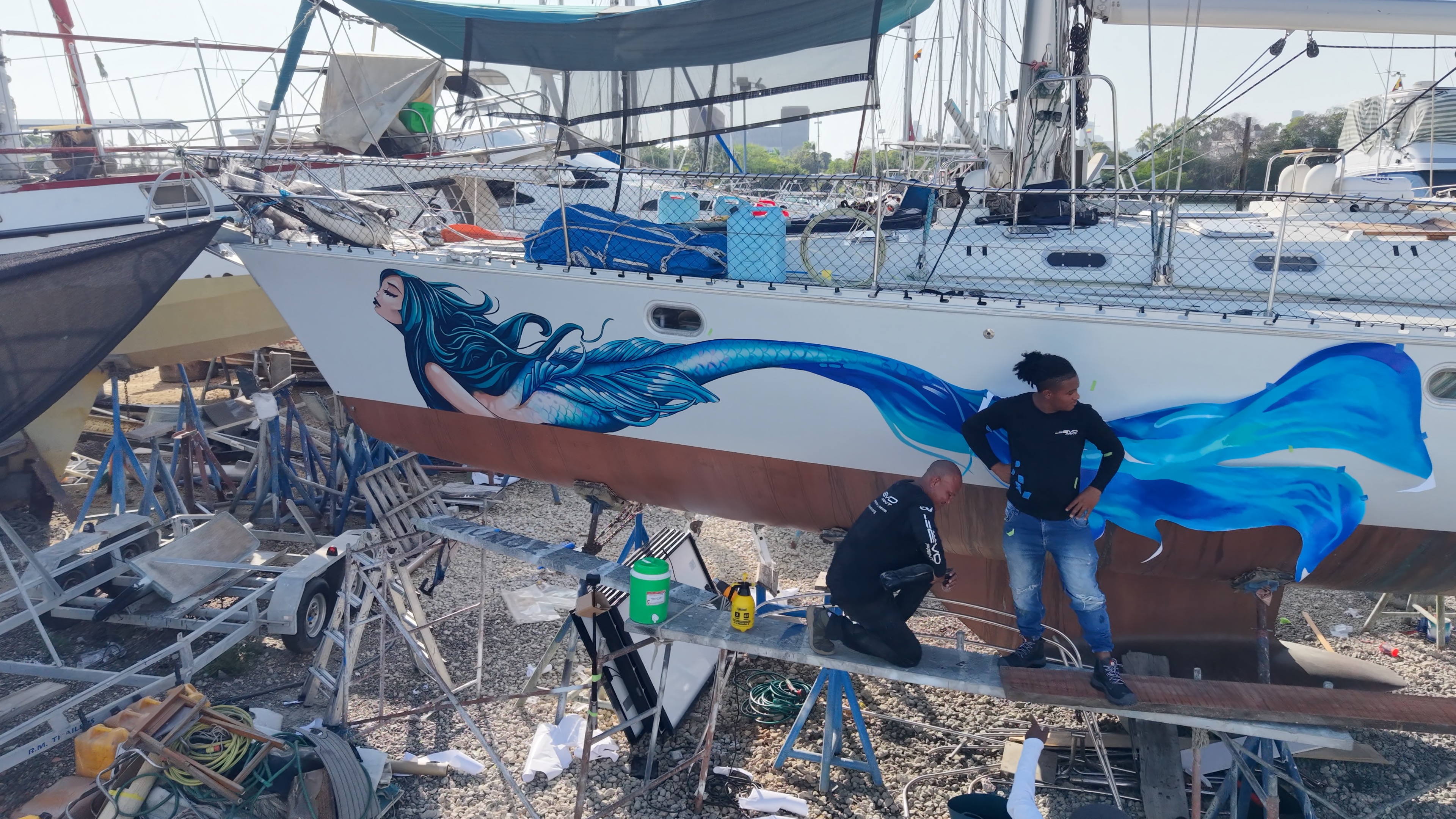 Episode still of mermaid graphic on the hull