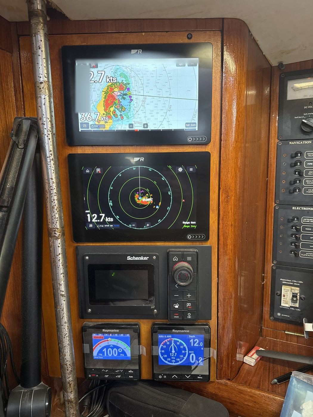 Nav station with dual Raymarine Axiom displays, RMK-10 keypad and twin i70s